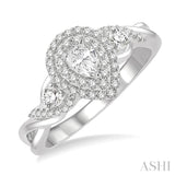 5/8 Ctw Split Twisted Shank Round Cut Diamond Engagement Ring With 1/4 Ct Pear Cut Center Stone in 14K White Gold