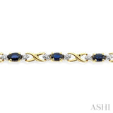5x3 MM Oval Cut Sapphire and 1/10 Ctw Round Cut Diamond Bracelet in 10K Yellow Gold
