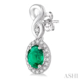 5x3 MM Oval Cut Emerald and 1/6 Ctw Round Cut Diamond Earrings in 14K White Gold