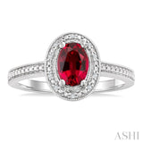 7X5 MM Oval Shape Lab-Created Ruby and 1/50 Ctw Round Cut Diamond Precious Ring in Sterling Silver
