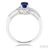6X4 MM Oval Cut Sapphire and 1/6 Ctw Round Cut Diamond Ring in 14K White Gold
