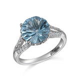 RGR22411-14K W/G 10MM BLUE TOPAZ & .20 CT RG-GH/SI2