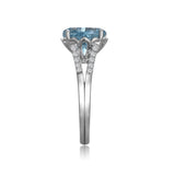 RGR22411-14K W/G 10MM BLUE TOPAZ & .20 CT RG-GH/SI2