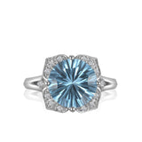 RGR22414-14K W/G .15CT SEMI W/ 10MM RD BLUE TOPAZ CTR-GH/SI2**