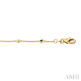 1.8 MM Emerald and 1/10 Ctw Bezel Set Round Cut Diamond Precious Gemstone Station Bracelet in 14K Yellow Gold
