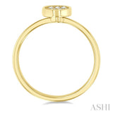 1/6 Ctw Petite Bezel Set Oval Shape Fusion Baguette and Round Cut Diamond Fashion Ring in 10K Yellow Gold