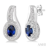 5x3 MM Oval Cut Sapphire and 1/50 Ctw Round Cut Diamond Earrings in Sterling Silver