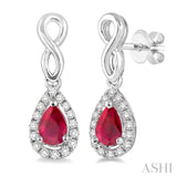 5x3 MM Pear Shape Ruby and 1/6 Ctw Round Cut Diamond Earrings in 10K White Gold