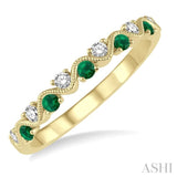 1/6 Ctw Round Cut Diamond and 1.80mm Emerald Precious Waves Wedding Band in 14K Yellow Gold