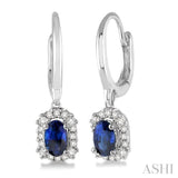5x3 MM Oval Cut Sapphire and 1/6 Ctw Round Cut Diamond Earrings in 14K White Gold