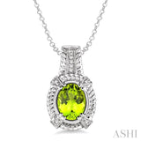 9x7 mm Oval Cut Peridot and 1/50 Ctw Single Cut Diamond Pendant in Sterling Silver with Chain